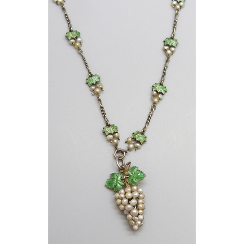 7087 - A white metal, enamel and seed pearl vine necklace, with control marks to ring, 19g, 44cm