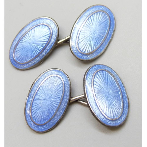 7092 - A pair of early 20th Century silver and blue guilloche enamel cufflinks, in a box