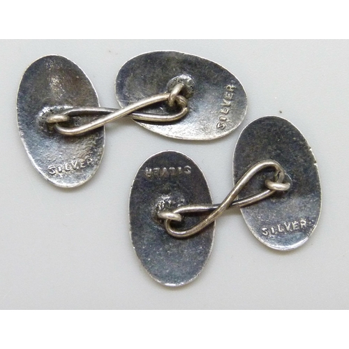 7092 - A pair of early 20th Century silver and blue guilloche enamel cufflinks, in a box