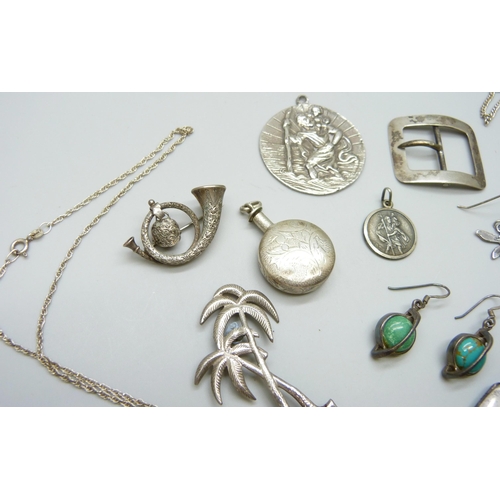 7093 - A collection of silver jewellery including a small George Jensen locket, brooches, a buckle, etc., 6... 