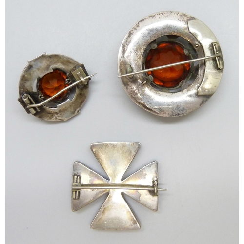 7098 - Three Victorian Scottish white metal stone set brooches, largest 4cm, 34g total