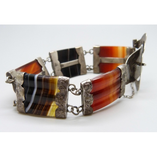 7100 - A Victorian Scottish white metal mounted agate set buckle panel bracelet, 29g, 1.8cm wide