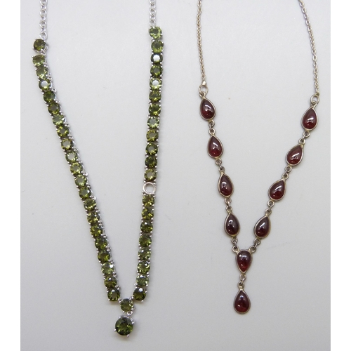 7112 - A silver and garnet set necklace and a silver TGGC tennis necklace, 23g total