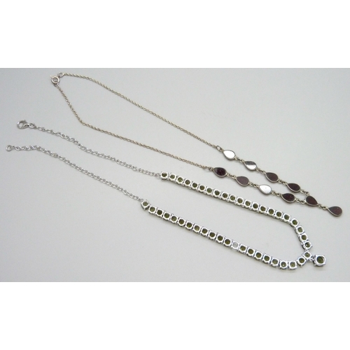 7112 - A silver and garnet set necklace and a silver TGGC tennis necklace, 23g total