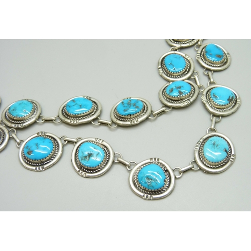 7126 - A Navajo sterling silver panel necklace set with turquoise, possibly Gilbert Damon, 48g, 41cm