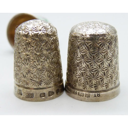 7127 - Four silver thimbles including a guilloche enamel example and Charles Horner, together with three ot... 