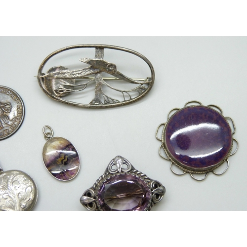 7129 - A white metal mounted Ruskin plaque, a silver set Blue John pendant, together with other silver jewe... 