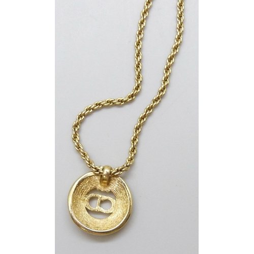 7141 - A Christian Dior necklace, chain a/f, pendant 2cm and attached to chain