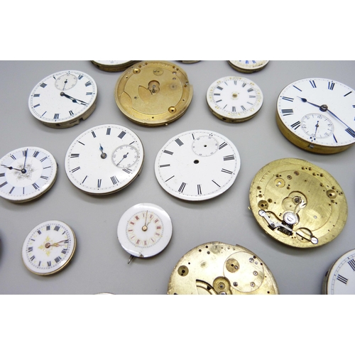 7153 - A collection of pocket watch movements and dials