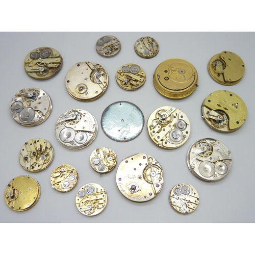 7153 - A collection of pocket watch movements and dials