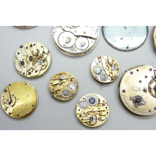 7153 - A collection of pocket watch movements and dials