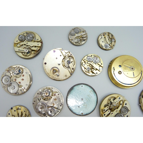 7153 - A collection of pocket watch movements and dials