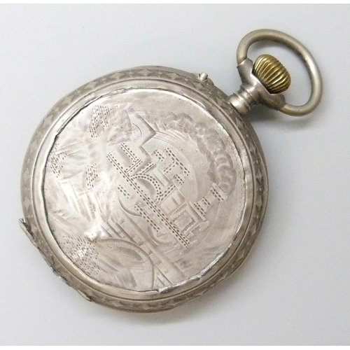 7156 - A large French .800 silver pocket watch with enamelled dial, engraved locomotive detail to case back... 