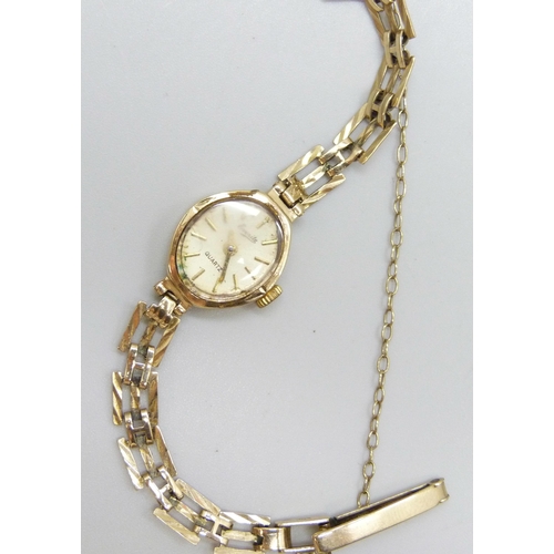 7159 - A lady's 9ct gold cased wristwatch on a 9ct gold strap, 6.1g without movement