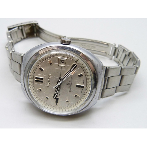 7161 - A stainless steel Sicura wristwatch, 25 jewels automatic movement on a riveted bracelet, date apetur... 