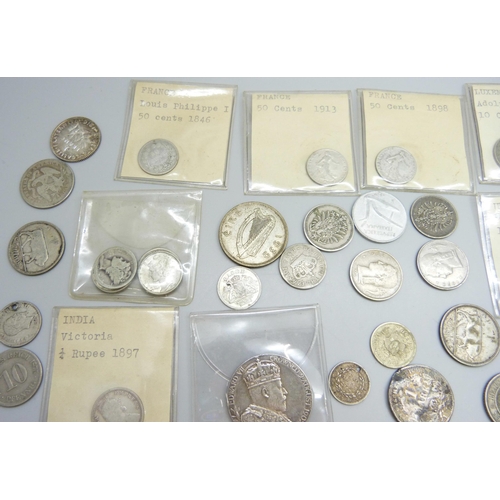 7200 - A collection of coins including USA, India, South Africa, Luxembourg, France, etc.