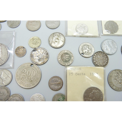 7200 - A collection of coins including USA, India, South Africa, Luxembourg, France, etc.