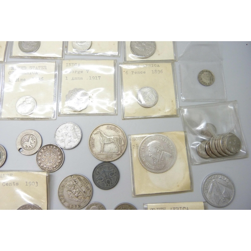 7200 - A collection of coins including USA, India, South Africa, Luxembourg, France, etc.