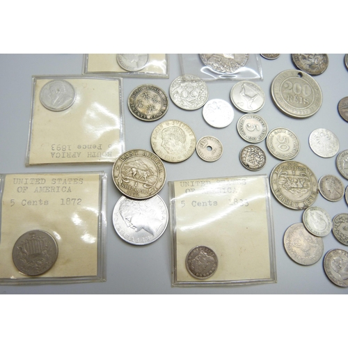 7200 - A collection of coins including USA, India, South Africa, Luxembourg, France, etc.