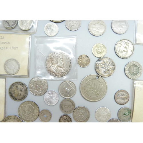 7200 - A collection of coins including USA, India, South Africa, Luxembourg, France, etc.