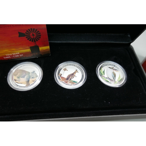 7220 - The Perth Mint, Australian Outback coloured silver coin collection ½oz silver three coin set, with c... 