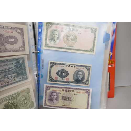 7224 - A folder containing world bank notes including Germany, Japan, Turkey, USA, Argentina, etc.