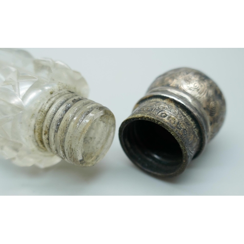 7233 - A Victorian silver mounted cut glass double ended scent bottle with monogram, Brockwell & Co, London... 