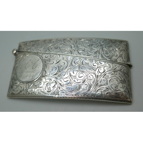 7242 - A silver Victorian engraved card case with inscription dated 1898, 36g