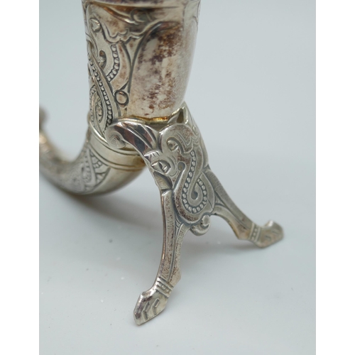 7243 - A pair of Theodor Olsen Norwegian silver salt and pepper pots in the form of Viking drinking horns, ... 