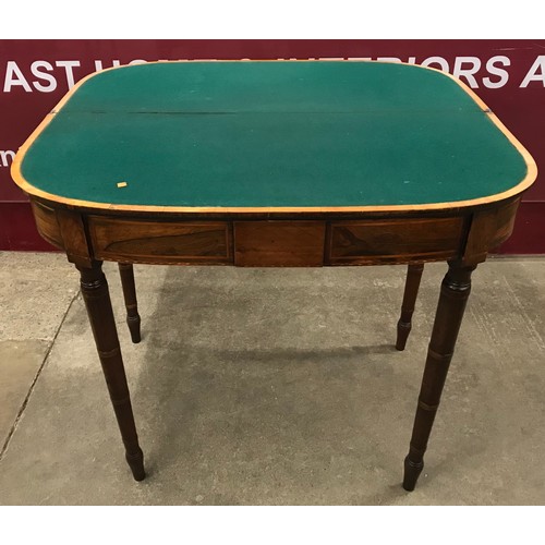 109 - A George IV rosewood and satinwood D-shaped fold over games table