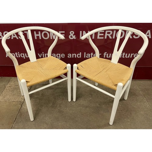 81 - A pair of Hans Wegner style white painted wishbone chairs