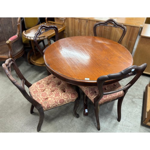 276 - A set of four Victorian Cuban mahogany dining chairs and a Victorian circular mahogany breakfast tab... 