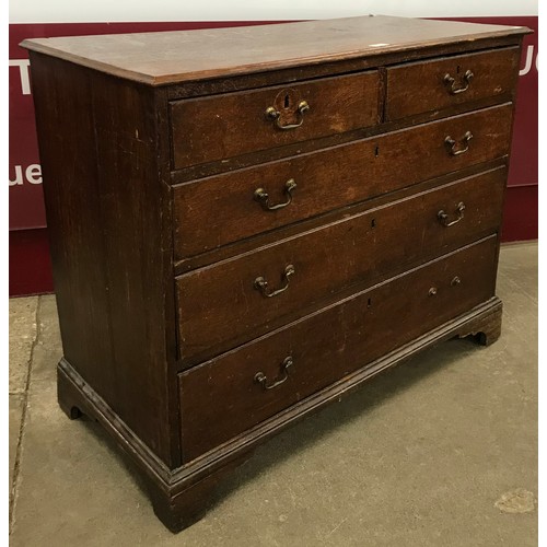 128 - A George III oak chest of drawers