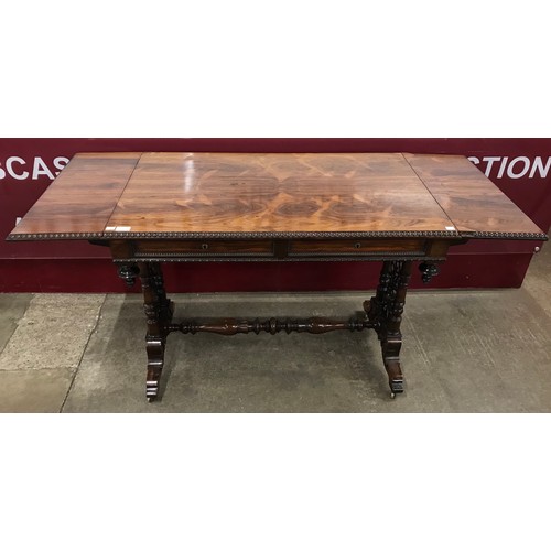 132 - A Regency Goncalo Alves two drawer sofa table