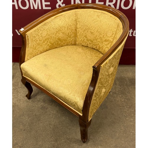 228A - An Edward VII mahogany and fabric upholstered tub chair