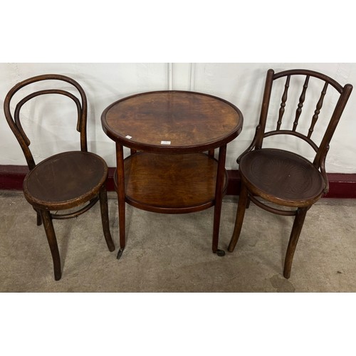 176 - A Fischel beech bentwood oval table and two chairs