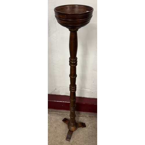 178 - A French oak torchere