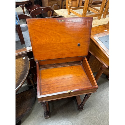 203 - A Victorian walnut Davenport