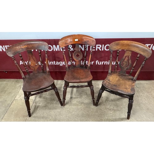 181 - A pair of Victorian elm and beech kitchen chairs and one other