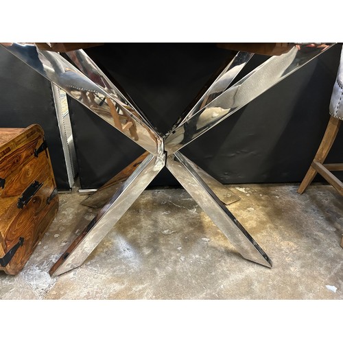 3045 - A Chennai wooden bar table with a chrome X-frame base frame *This lot is subject to VAT