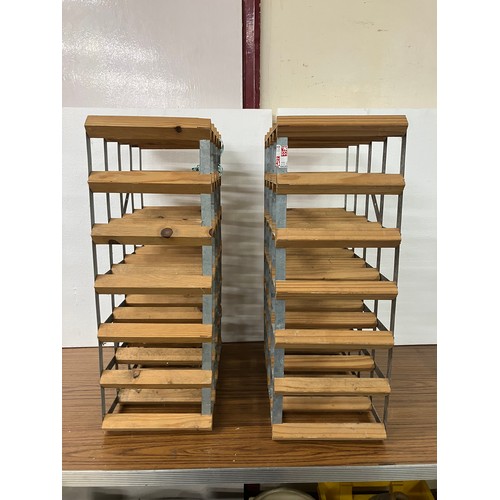 300 - A pair of pine and aluminium wine racks and a brass wastepaper bin