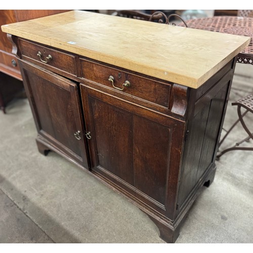 215 - A George III oak and pine scrub top pantry cupboard