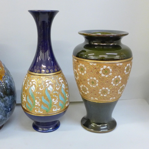 2004 - A pair of Royal Doulton Art Nouveau stoneware vases, 23cm, one a/f, badly cracked, and two other sto... 