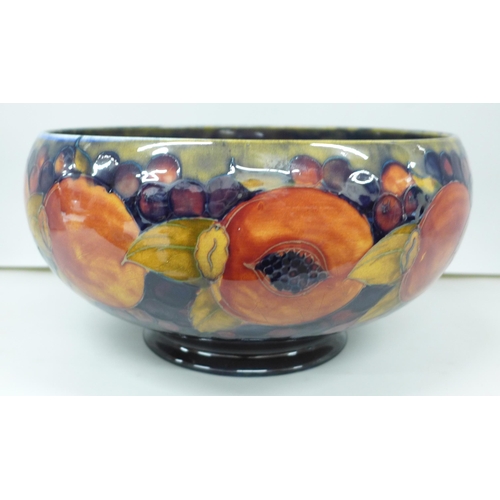 2005 - A large Moorcroft open pomegranate fruit bowl, impressed mark 274, painted signature, 29cm diameter,... 