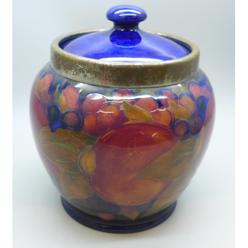 2006 - A Moorcroft pomegranate caddy, impressed mark M122 Y, painted signature, a/f, large crack, 14.5cm