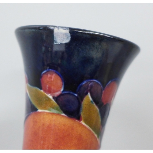 2007 - A Moorcroft pomegranate tall neck vase, painted signature to the base, 32cm, very small chip on the ... 