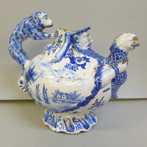 2011 - An 18th Century Dutch Delft jug with monkey handle, a/f, spout chipped