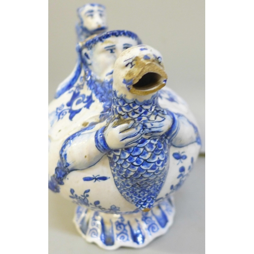 2011 - An 18th Century Dutch Delft jug with monkey handle, a/f, spout chipped