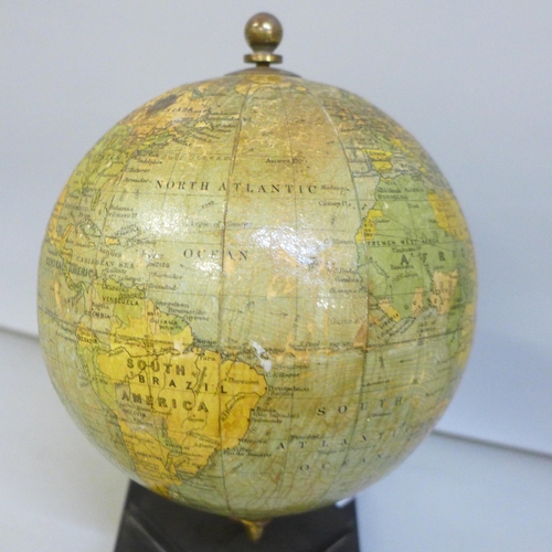 2012 - A 1930s globe on metal mount and Bakelite stand, stand 10cm