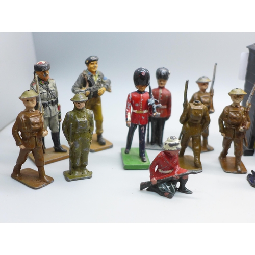 2033 - A collection of mainly Britains model soldiers, a sentry box and two del Prado figures, 24 pieces in... 